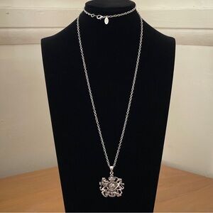 Cookie Lee silver tone chain.